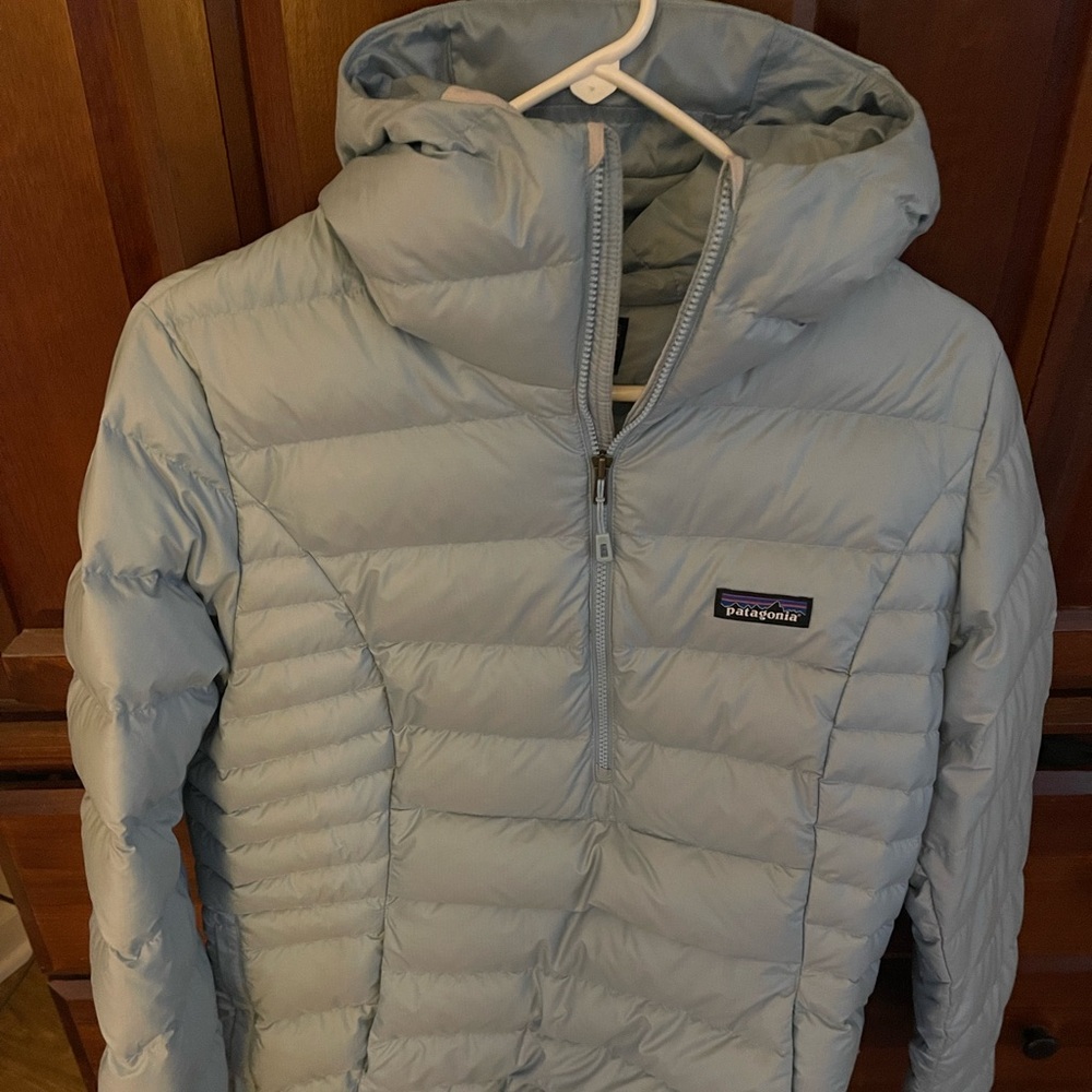 Patagonia half zip down jacket with hood . Baby blue. Excellent condition.